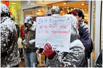 http://www.urban75.org/blog/brixton-topshop-and-vodafone-protests-brave-the-blizzards/